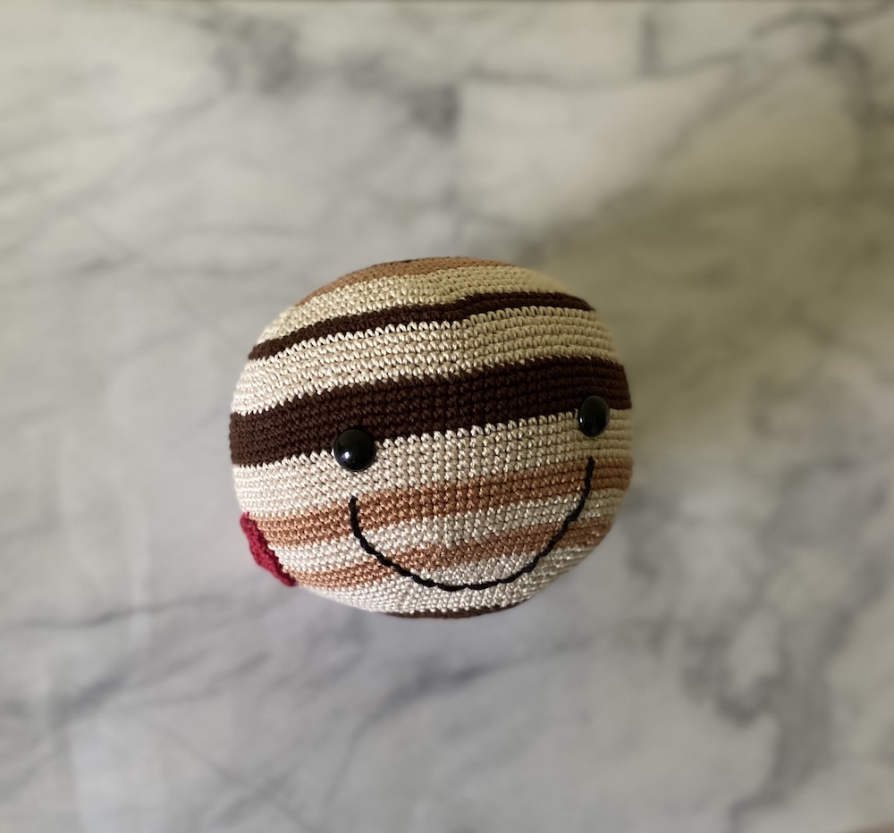 Photo of crocheted Jupiter planet